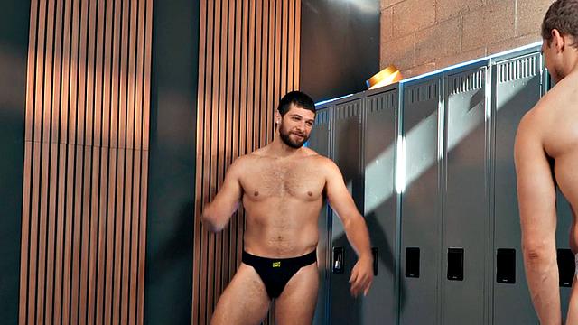 Muscled jock barebacking bottom in gym locker room