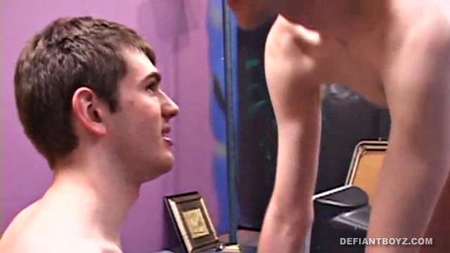 After making out, Dorian Jensen and James O'Neil strip and pleasure each other's cock. Dorian cums on James' face and receives a messy facial.