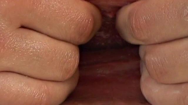 Oiled teen gapes and masturbates her wet and shaved pussy