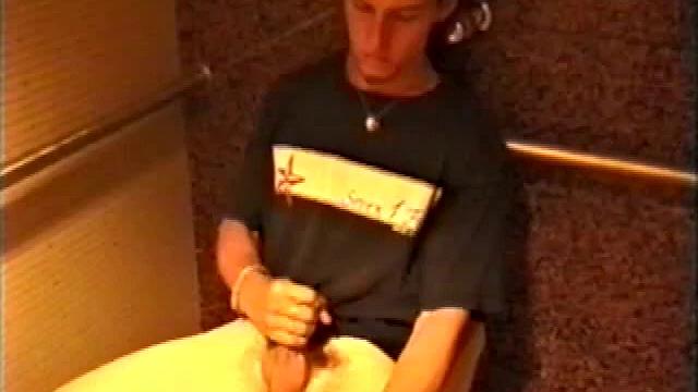 At first we watch shirtless Adam do some skateboarding tricks. Then, when he gets really horny, the young man skates off to a public restroom where he jerks off in one of the big stalls.