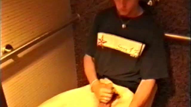 At first we watch shirtless Adam do some skateboarding tricks. Then, when he gets really horny, the young man skates off to a public restroom where he jerks off in one of the big stalls.
