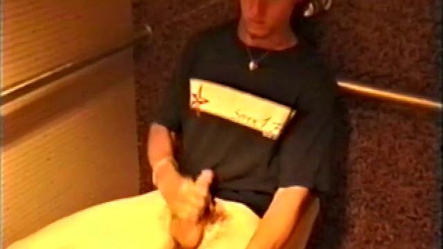 At first we watch shirtless Adam do some skateboarding tricks. Then, when he gets really horny, the young man skates off to a public restroom where he jerks off in one of the big stalls.