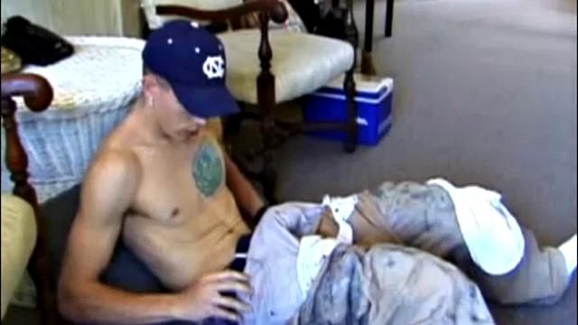 Taking a break from yard work, Shane strips naked and starts stroking his cock. While working the TV remote, Shane edges himself toward the big finish.