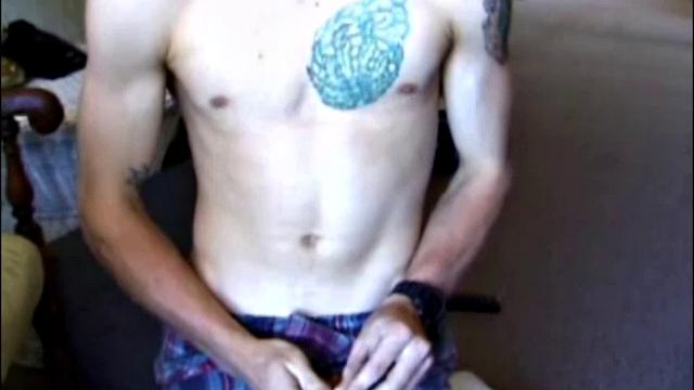 Taking a break from yard work, Shane strips naked and starts stroking his cock. While working the TV remote, Shane edges himself toward the big finish.