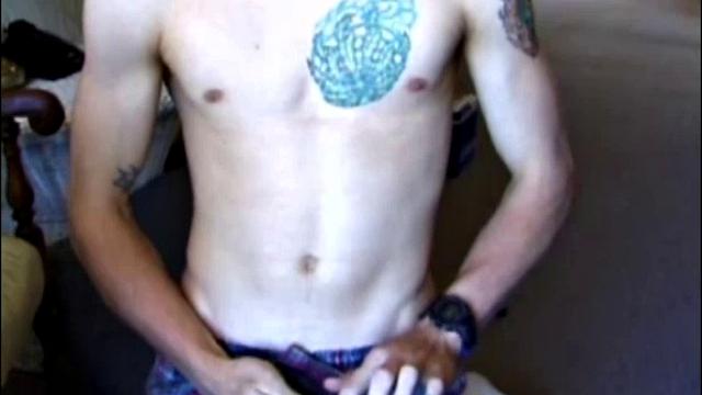 Taking a break from yard work, Shane strips naked and starts stroking his cock. While working the TV remote, Shane edges himself toward the big finish.