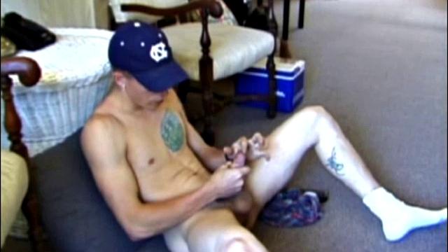 Taking a break from yard work, Shane strips naked and starts stroking his cock. While working the TV remote, Shane edges himself toward the big finish.