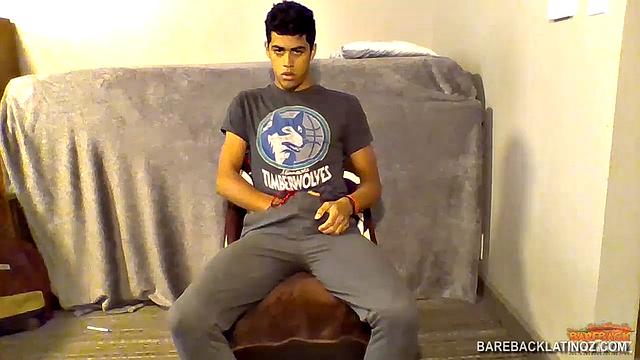 Our featured solo boy of the week is Roberto Sanz, a droopy eyed Latin boy, who almost looks bored as he strips out of his pants and underwear to reveal his uncut cock.