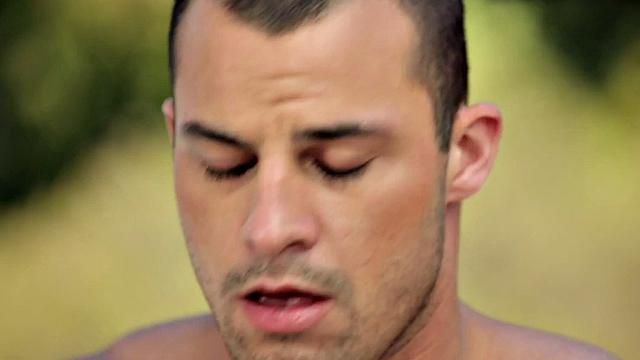 Shaved amateur plays with his shaft outdoors