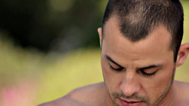 Shaved amateur plays with his shaft outdoors