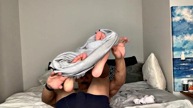 Parked on his bed, Joseph slowly starts stripping out of his clothes. Down to his boxers, he pulls out his huge cock and balls, and begins working up a stiff one. Once hard, the young Latino gets completely naked and starts beating off.