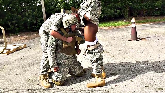 Black army bottom fucked while sucking in 3way outdoors