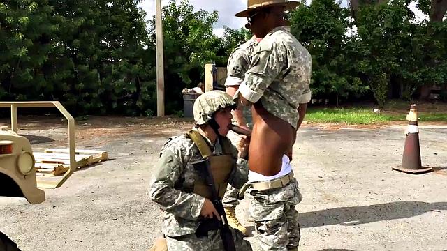 Black army bottom fucked while sucking in 3way outdoors