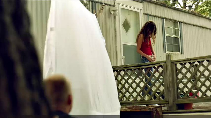 Riley Keough striptease