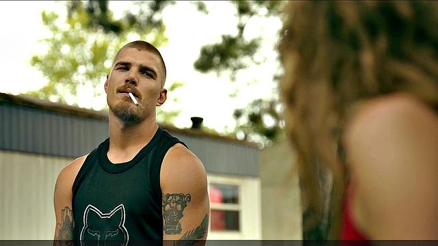 Riley Keough striptease