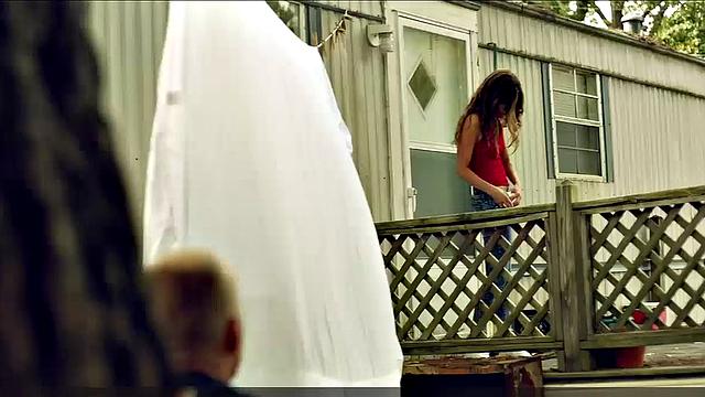 Riley Keough striptease