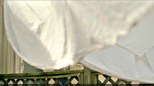 Riley Keough striptease