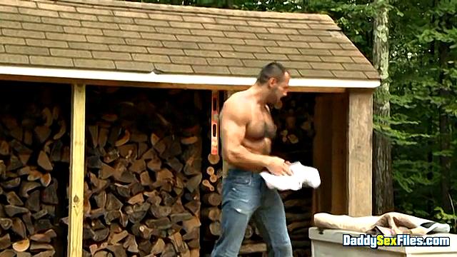 Colby Keller fucks Arpad Miklos by the woodpile
