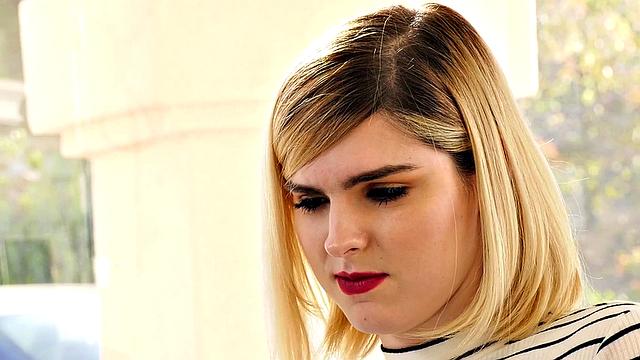 Small-breasted blonde tgirl in heels bred from behind