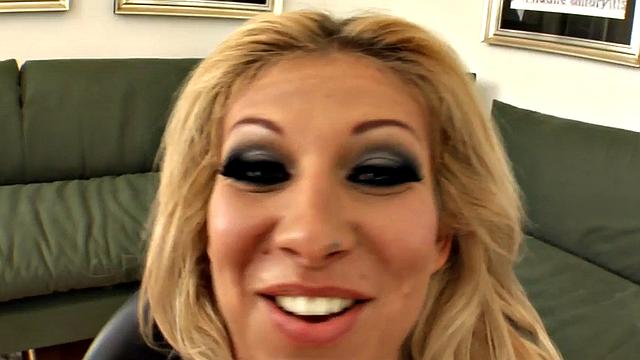 Blonde MILFs with big tits fist each other's assholes in lingerie and stockings