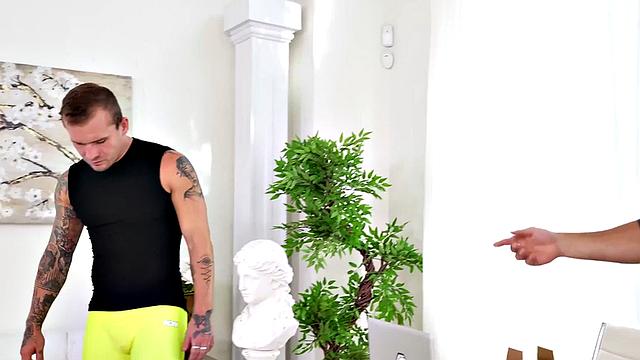 Mesmerized tattooed jock deepthroating cock