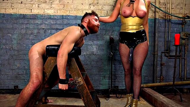 Busty mistress seducing sub with feet while jerking him