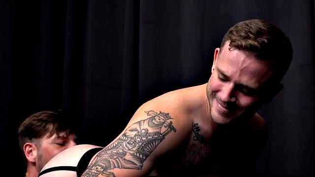 Barebacking top stud fucks tattooed bottom in jock ass