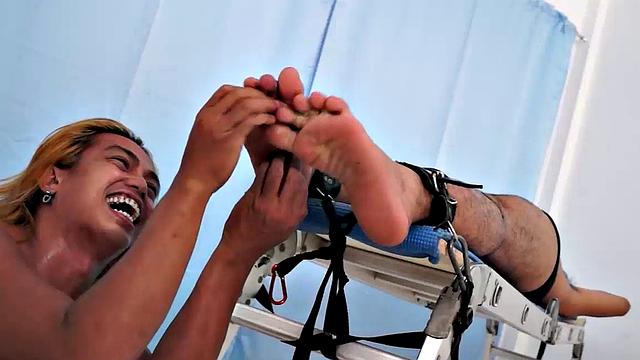 Cyruz returns for his first tickling session on the rack. Hunter and Idol are the ticklers who put this chubby Asian boy through a tickle fetish adventure!