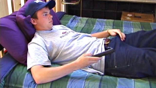 Sweet young Connor comes ready to jerk off. He lies down, sticks his hands in his pants and works up a stiffy. Soon his mushroom head cock bursts forth its cum load, all over his stomach.