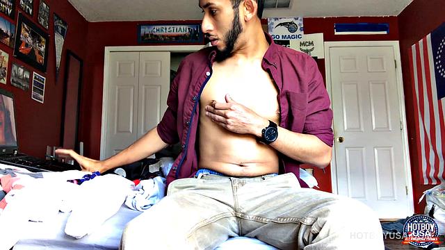 Handsome young Brian is in his bedroom watching porn on the bed, as he begins to work himself stiff. Suddenly, a big cock pops out the fly of his boxers, and he starts stroking, while occasionally glancing at the porn playing on his laptop.