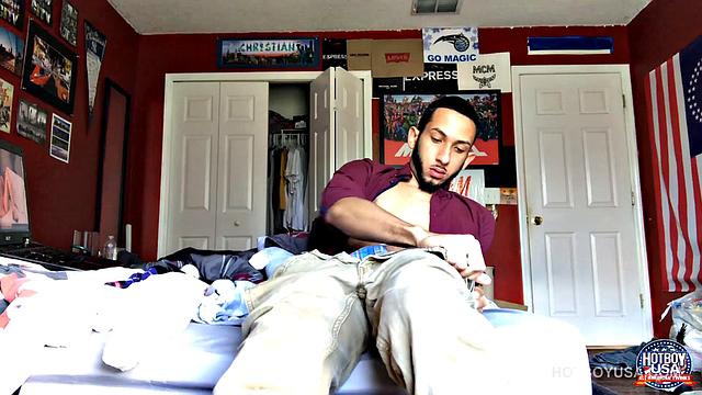 Handsome young Brian is in his bedroom watching porn on the bed, as he begins to work himself stiff. Suddenly, a big cock pops out the fly of his boxers, and he starts stroking, while occasionally glancing at the porn playing on his laptop.