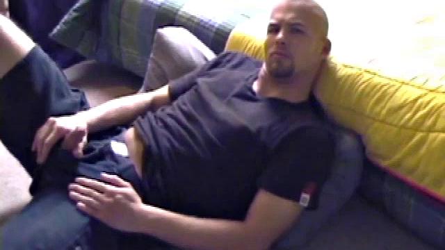 Stephen starts by unzipping and pulling out his cock to get hard. Stripped naked, he lays on his back, lubes up, and gets down to some serious stroking. Switching hands, he tightens his grip and cums like a sprinkler all over his chest.