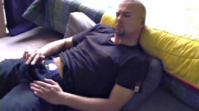 Stephen starts by unzipping and pulling out his cock to get hard. Stripped naked, he lays on his back, lubes up, and gets down to some serious stroking. Switching hands, he tightens his grip and cums like a sprinkler all over his chest.