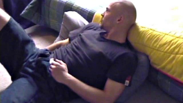 Stephen starts by unzipping and pulling out his cock to get hard. Stripped naked, he lays on his back, lubes up, and gets down to some serious stroking. Switching hands, he tightens his grip and cums like a sprinkler all over his chest.