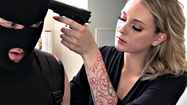 Strapon mistress shows dominance to uninvited guest