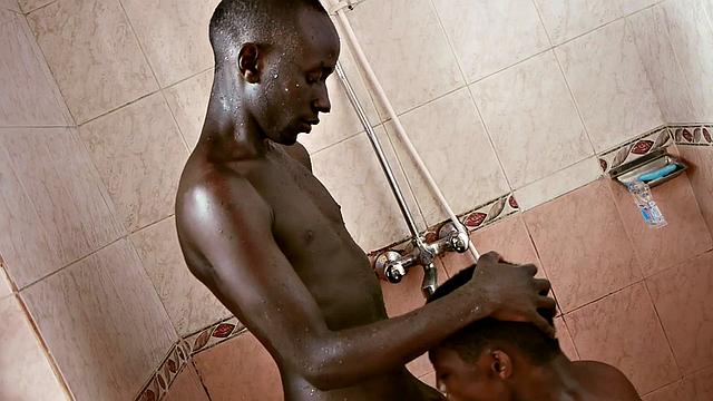 Twink from Africa deepthroating BF under shower
