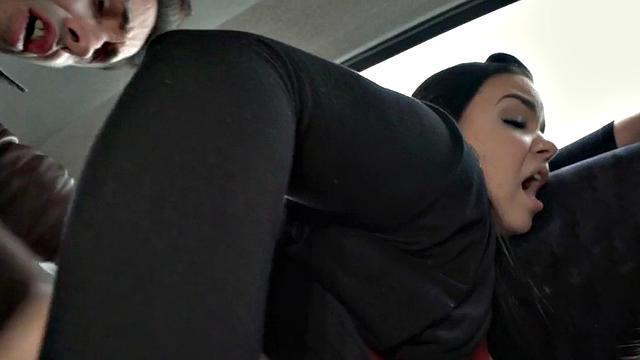 Busty cab driver in stockings riding client in backseat