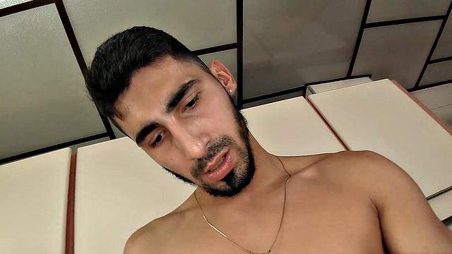 We find Julian in the kitchen, as his clothes slowly hit the floor. He pushes his pants and underwear down and a big boner pops out. Once Julian is completely naked, he leans against a counter and starts jacking off.