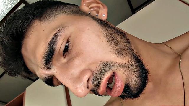 We find Julian in the kitchen, as his clothes slowly hit the floor. He pushes his pants and underwear down and a big boner pops out. Once Julian is completely naked, he leans against a counter and starts jacking off.