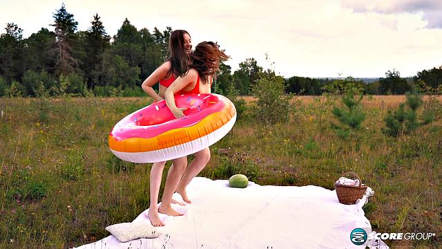 Margo Von Teese and Simona splash each other in their bikinis before eating each
