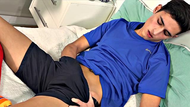 Sporty Latino toys his butthole and jerks off indoors