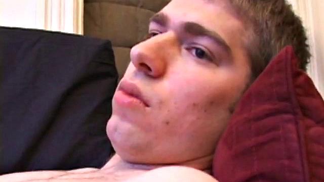 Adam Turner strips naked and grabs the lube, as he checks out a video that's playing. He works himself stiff and strokes with determination, until his cum starts pumping.