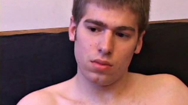 Adam Turner strips naked and grabs the lube, as he checks out a video that's playing. He works himself stiff and strokes with determination, until his cum starts pumping.