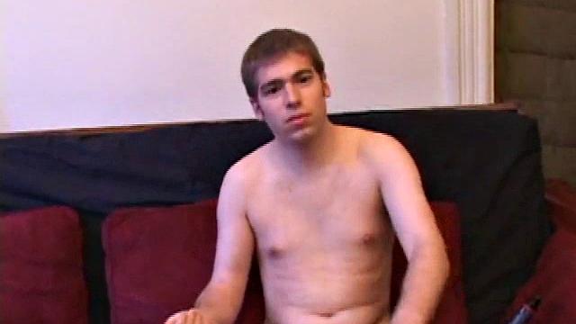 Adam Turner strips naked and grabs the lube, as he checks out a video that's playing. He works himself stiff and strokes with determination, until his cum starts pumping.