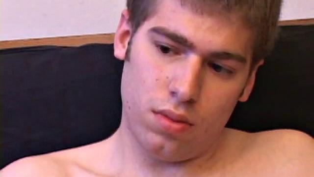 Adam Turner strips naked and grabs the lube, as he checks out a video that's playing. He works himself stiff and strokes with determination, until his cum starts pumping.