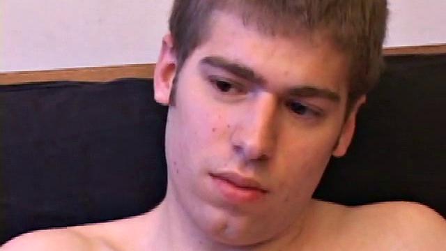 Adam Turner strips naked and grabs the lube, as he checks out a video that's playing. He works himself stiff and strokes with determination, until his cum starts pumping.