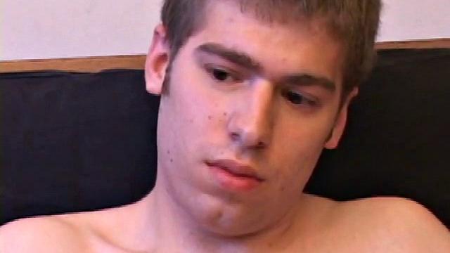 Adam Turner strips naked and grabs the lube, as he checks out a video that's playing. He works himself stiff and strokes with determination, until his cum starts pumping.