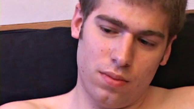 Adam Turner strips naked and grabs the lube, as he checks out a video that's playing. He works himself stiff and strokes with determination, until his cum starts pumping.