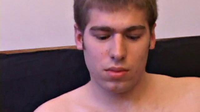 Adam Turner strips naked and grabs the lube, as he checks out a video that's playing. He works himself stiff and strokes with determination, until his cum starts pumping.