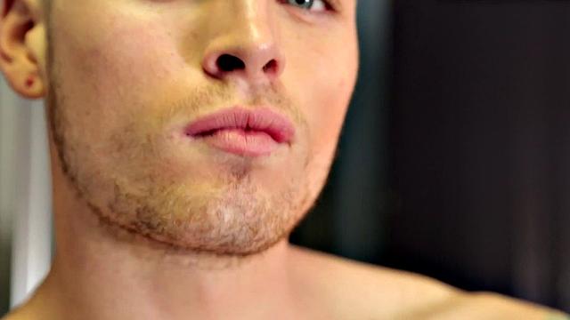 Tattooed jock rides dildo during solo action