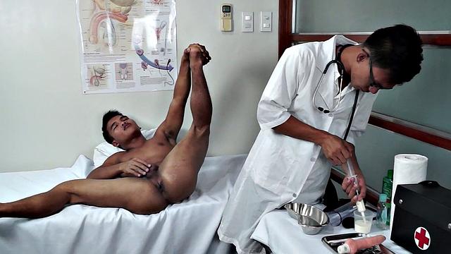 Asian doctor rims patient before toying asshole